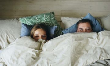 STD - Couple hiding under blanket